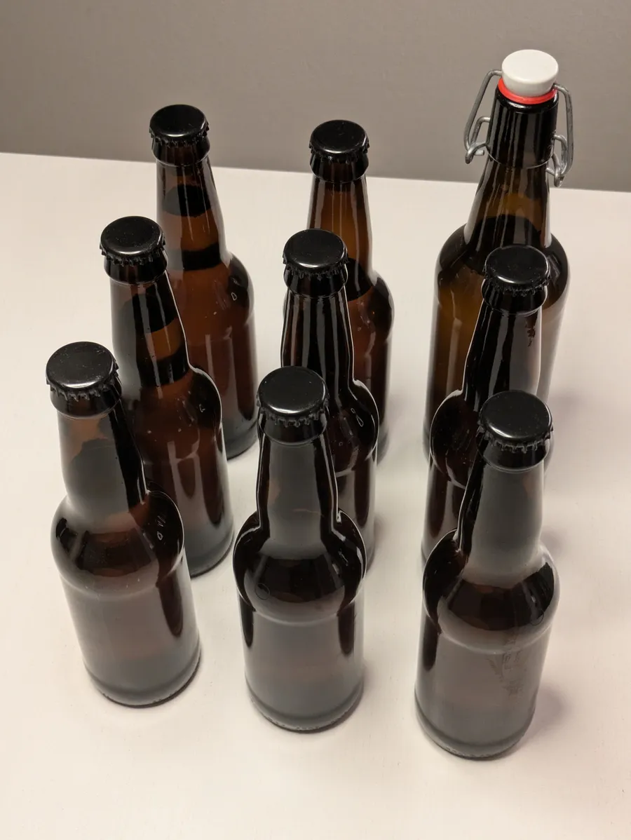 9 brown glass bottles, 8 33cl, 1 50cl, with vanilla kilju mead.
