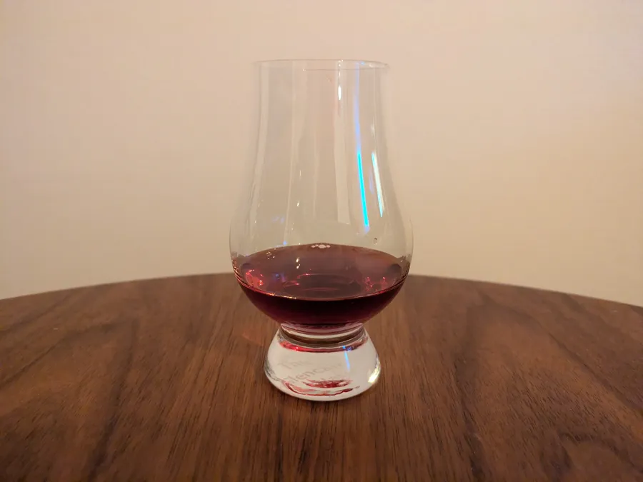 Dark woke mead in a Glencairnglas.