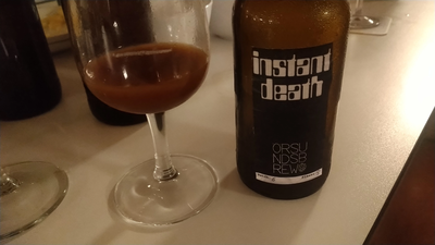 A glass and a bottle with beer "Instant Death Batch #6" by Örsundsbrew