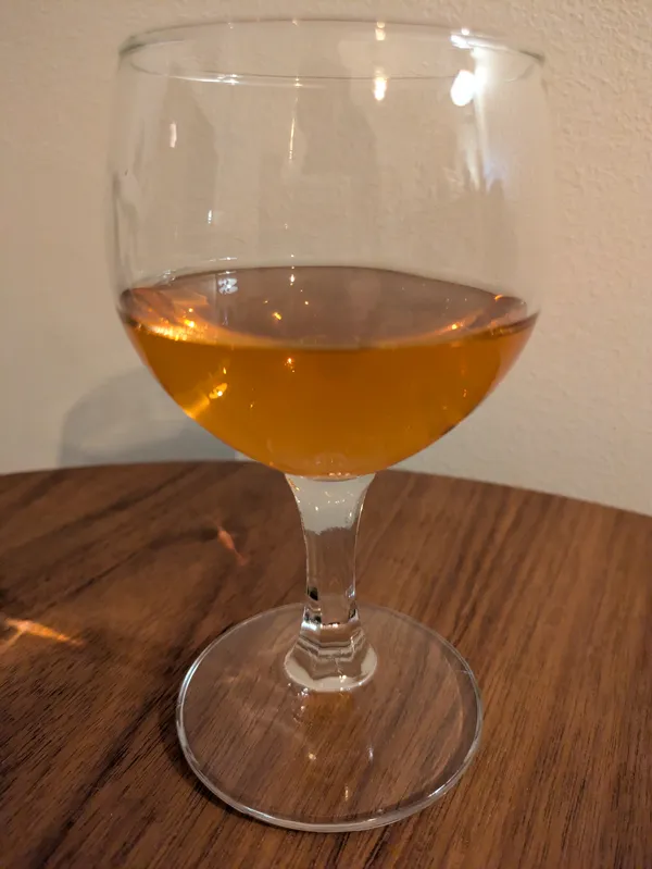 Strawberry mead in a small wine glas